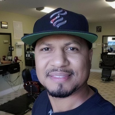 Emilio Resendiz, barber at Champ's Barber Shop